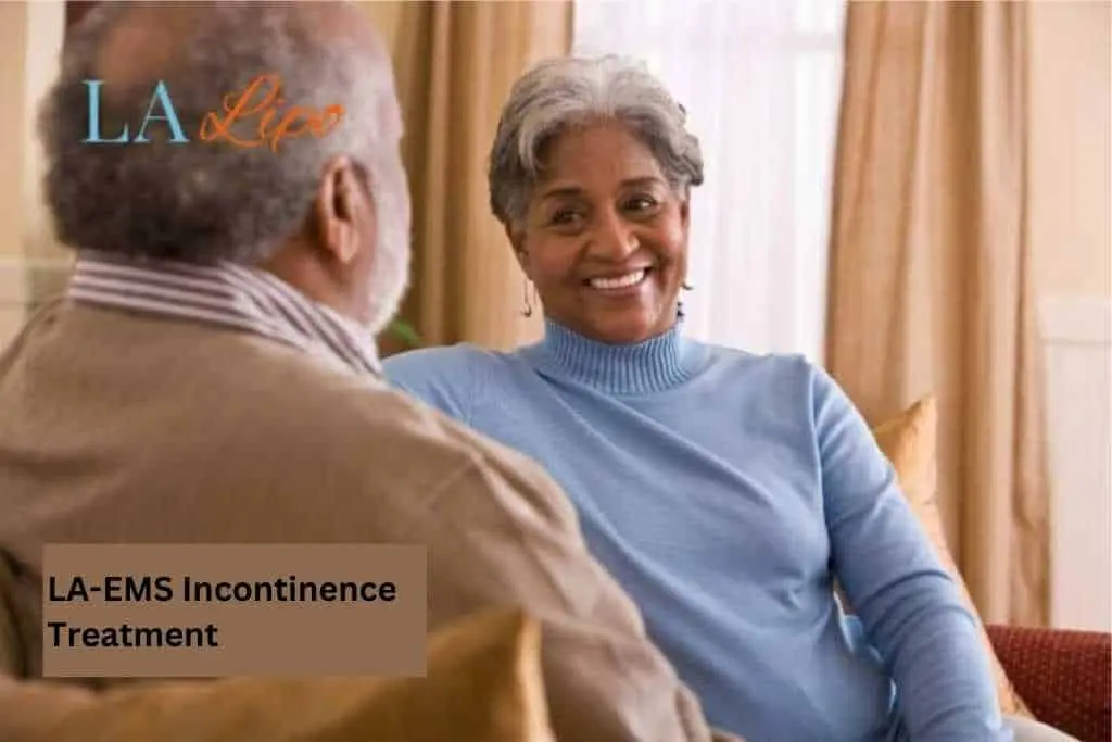 Couple sat smiling at each other - LA-EMS treatment Tilbury